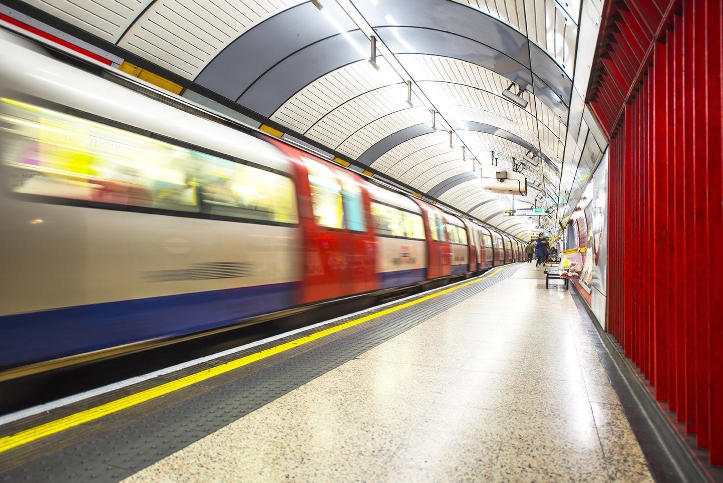 Transport for london tube train coming into a station